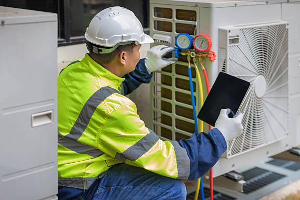 Professional Air Duct Cleaning technician working in Corbett, OR
